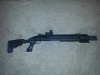 Mossberg 12 Black Aces Tactical rail.jpg